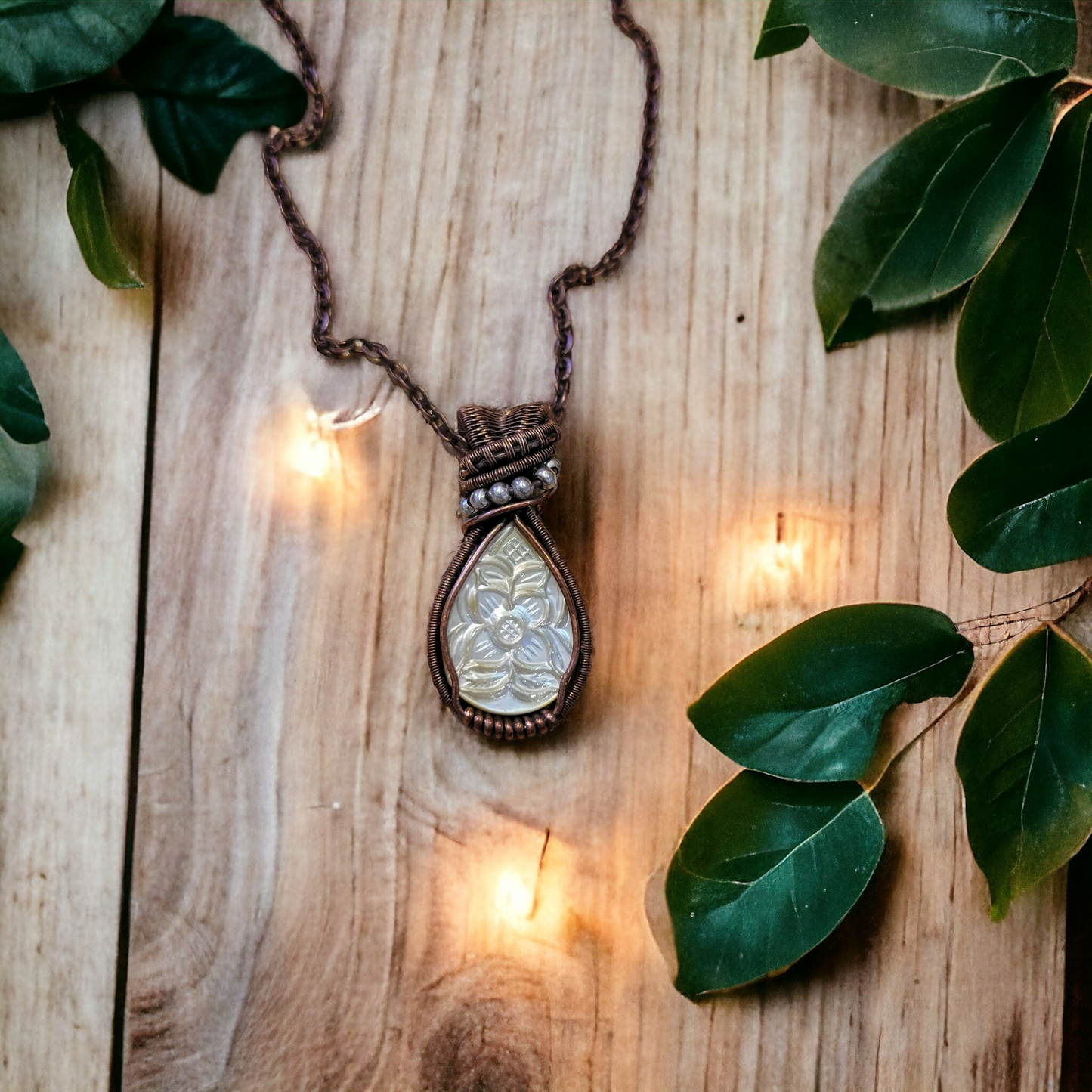 Carved Mother of Pearl Copper Necklace